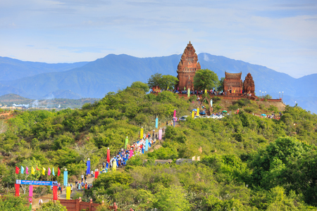 Phan Rang city, Vietnam - October 12, 2015: crowd of Vietnamese in tradition clothing, pick up print dress Ka Te festival, traditional culture of ancient Cham tower at Poklong peopleKate festival print Girai Phan Rang, Ninh Thuan provinceのeditorial素材