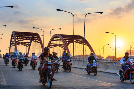 HoChiMinh City, Vietnam - December 11, 2015: Traffic on the scene Nguyen Van Linh road bridge at dawn OngLon print. Here is the important,, with curved arch bridge, located along the road leads to the Mekong Delta of South Vietnam m which areasのeditorial素材
