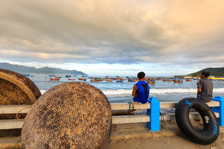 Nha Trang city, Vietnam - January 28, 2016: Fishing boats in the fishing village near NhaTrang city, Vietnamのeditorial素材