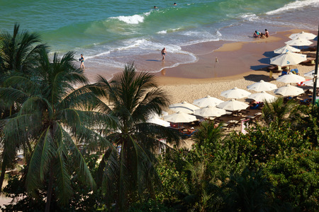 Nha Trang city, Vietnam - January 31, 2016: view from above the beach with parasols and lounge chairs to relax in the coastal city NhaTrang, Vietnamのeditorial素材