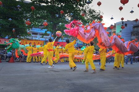Hochiminh City, Vietnam - February 22, 2016: Parade of dragons and lions in the lion dance ceremony of Chinese Vietnamese people on a street in the HoChiMinh city on season Tet holiday of lunar yearのeditorial素材