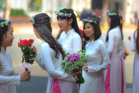 Hochiminh City, Vietnam - March 20, 2016 :  the beautiful girls in a  Aodai festival in the  center of HoChiMinh city. aodai is a symbol of Vietnamのeditorial素材