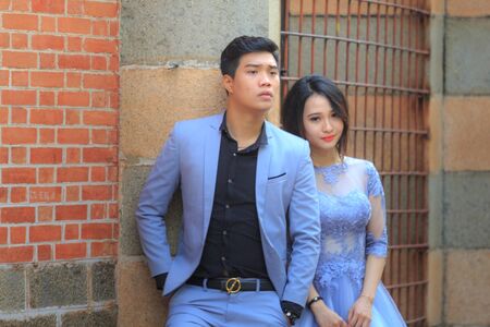 Hochiminh City, Vietnam - March 20, 2016 : Happy newlywed romantic couple have fun beside the Notre Dame Cathedral, downtown HoChiMinhのeditorial素材