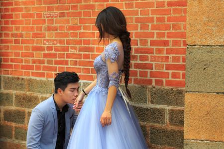 Hochiminh City, Vietnam - March 20, 2016 : Happy newlywed romantic couple have fun beside the Notre Dame Cathedral, downtown HoChiMinhのeditorial素材