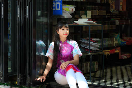 Hochiminh City, Vietnam - March 20, 2016 : portrait of an asian young girl. Lifestyle and travel concepts.のeditorial素材