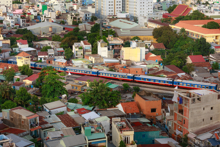 Ho Chi Minh City, Vietnam - July 01, 2016: trains passing through a crowded residential area in the city of Ho Chi Minh. The railway industry is Relatively backward here, 40 years agoのeditorial素材