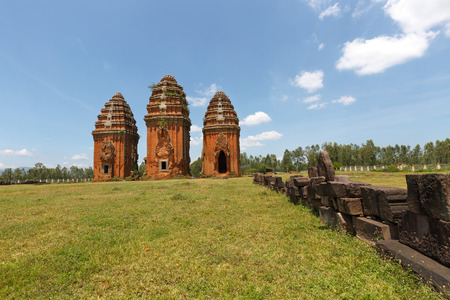 Binh Dinh Province, Vietnam - August 28, 2016: towers "Champa" is built from the late 7th century to the early 17th century. Image of three towers Duong Long towers Cham ruins on a high mound venture Tay Son District, Binh Dinh Province.のeditorial素材