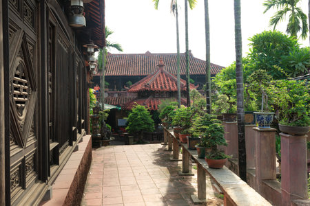 Qui Nhon city, Binh Dinh Province, Vietnam - August 27, 2016: the image of a wooden house with architecture typical of ancient Vietnam in the 19th century remains in Binh Dinh Province, Vietnamのeditorial素材
