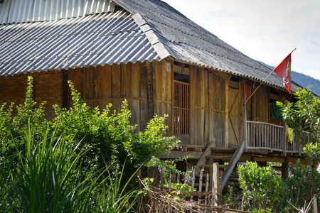 wooden stilts house of ethnic minorities in the high mountains northwest, Vietnam. House on stilts is kind of house that the floor put halfway columns, higher than ground or water surface,often seen in forest and mountain. The ethnic minority usually liveのeditorial素材