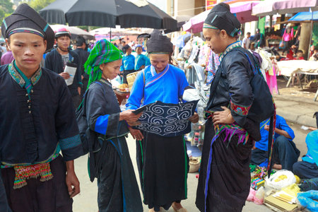 Hoang Su Phi, Ha Giang province, Vietnam - October 2, 2016: ethnic minority people set out the agricultural products homemade by themselves at the Sunday fair in Hoang Su Phi. they selling and exchanging homemade products such as : wine, knife, textiles, のeditorial素材