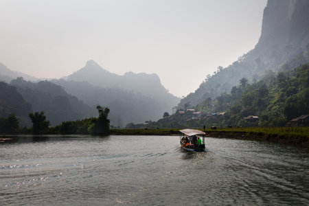Ba Be lake, Bac Kan province, Vietnam - September 22, 2016 : tourists on the boat are going to enjoy and explore Ba Be lake. Stunning scenery of Ba Be Lake in Bac Kan Province, Vietnamのeditorial素材