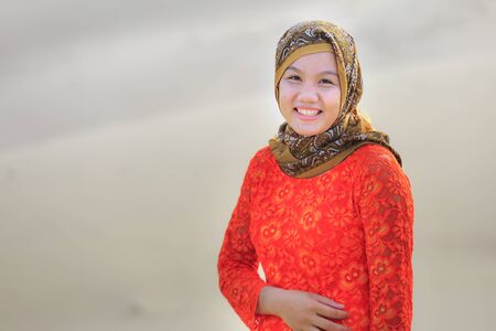 Phan Rang city, Viet Nam - December 24, 2016 : Beautiful portrait of Cham girl, minority ethnic of Vietnamese, pretty women in traditional dress on the sand dunesのeditorial素材