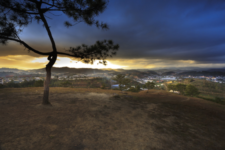Da Lat town, Vietnam - February 18, 2017: Image of the sunrays into the sunset down a valley with full of greenhouses in Da Lat town, Viet Namのeditorial素材