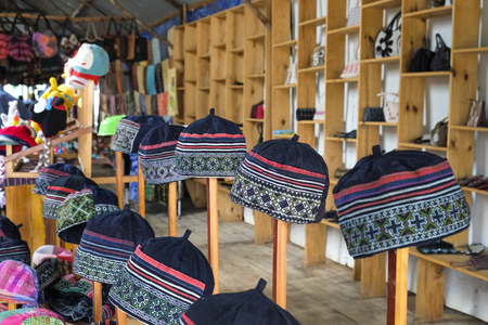 Da Lat town, Vietnam - February 19, 2017: inside a shop, where specially in selling brocade, clothes, and hand-woven headwear of ethnic minority people in the village, near Dalat town, Vietnamのeditorial素材