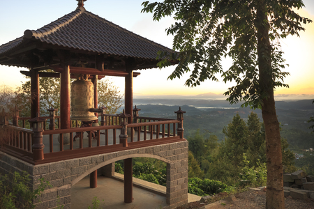 "Linh Quy Phap An" temple, Bao Loc town, Lam Dong Province, Vietnam - February 28, 2017: the bell tower at "Linh Qui Phap An" temple, near Bao Loc town, Lam Dong province, Vietnam.のeditorial素材