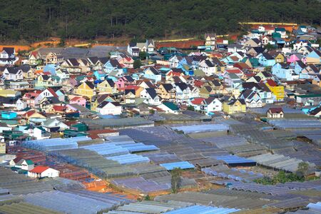 Da Lat town,Vietnam - April 29, 2017 : The colorfull houses beside the greenhouse to plant flowers and vegetables in valley. Da lat is one of the best tourism city in Vietnam.のeditorial素材