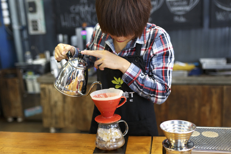 Da Lat town,Vietnam - April 30 ,2017 : professional coffee staff doing their work at the "La Viet" cafe in Da Lat town, Vietnamのeditorial素材