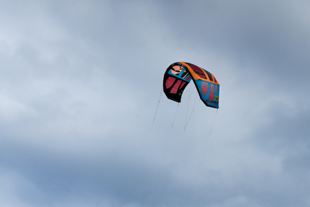 Ninh Chu Beach, Ninh Thuan Province, Vietnam - February 11, 2018: Tourists Kitesurfing on the waves of the sea the beach on a sunny day at Ninh Chu beach in Vietnamのeditorial素材