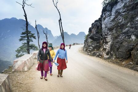 Ha Giang Province, Vietnam - January 16, 2018: H'Mong ethnic minority children in the most beautiful clothes happy to welcome Lunar New Year, H'Mong traditional Lunar Yearのeditorial素材