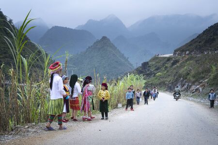 Ha Giang Province, Vietnam - January 16, 2018: H'Mong ethnic minority children in the most beautiful clothes happy to welcome Lunar New Year, H'Mong traditional Lunar Yearのeditorial素材