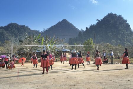 Moc Chau, Son La Province, Vietnam - January 20, 2018: H'Mong ethnic minority children in the most beautiful clothes playing together to welcome H'Mong Lunar New Yearのeditorial素材