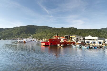 The pier in Da Nang, Vietnam - June 28, 2018: a ship repairing pier located under Thuan Phuoc Bridge in Da Nang City, Vietnamのeditorial素材