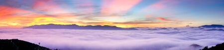 The panorama fanciful of an early morning when the sun rises over the Dai Lao mountain range, Bao Loc district, Lam Dong province, Vietnamの写真素材