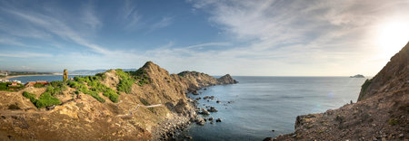 The panoramic scene at Eo Gio, Quy Nhon, Binh Dinh, Vietnam. Eo Gio (Wind Strait) - the most spectacular strait with a bow-shaped range of mountainの写真素材