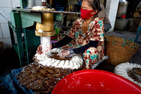 Phan Thiet, Binh Thuan Province, Vietnam - May 16, 2020: Scene of a manual production facility of...