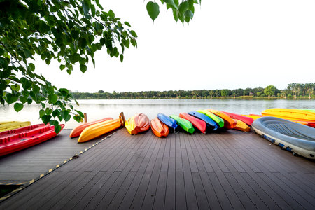 Colorful fiberglass kayak in dock in Ecopark, Xuan Quan, Van Giang, Hung Yen, Vietnam