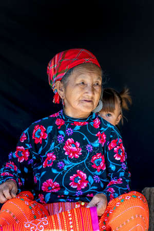 Moc Chau, Son La Province, Vietnam - July 13, 2020: A beautiful portrait of grandma and grandson of ethnic minoritie in Moc Chau district, Son La province, Vietnamのeditorial素材