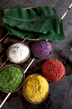 Colorful rice. Each type of rice is dyed with a different type of leaf, herb. Thai style in MCの写真素材
