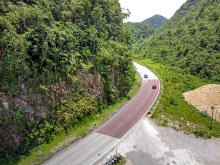 Thung Khe Pass, Son La Province, Vietnam - July 14, 2020: Highway 6 section passes through Thung Khe Pass viewed from aboveのeditorial素材