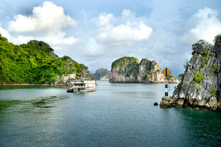 Ha Long Bay, Quang Ninh Province, Vietnam - July 2, 2020: Cruise Boats on Halong Bay at summer. The magnificent scenery of Halong Bay. North Vietnam.のeditorial素材