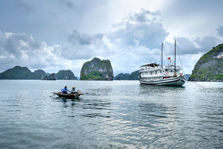 Ha Long Bay, Quang Ninh Province, Vietnam - July 3, 2020: Cruise Boats on Halong Bay at summer. The magnificent scenery of Halong Bay. North Vietnam.のeditorial素材