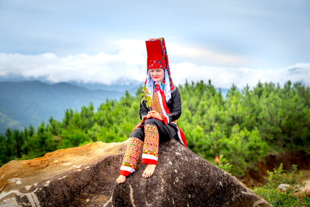 Binh Lieu District, Quang Ninh Province, Vietnam - July 4, 2020: The ethnic minority girls Dao Thanh Phan in colorful traditional costumes in Binh Lieu District, Quang Ninh Province, Vietnamのeditorial素材