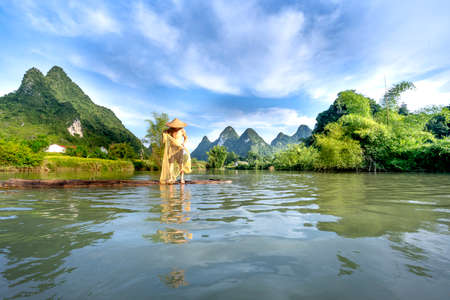 Quay Son River in Phong Nam District, Cao Bang Province, Vietnam - September 13, 2020: Fishermen fishing on Quay Son River in Phong Nam District, Cao Bang Province, Vietnamのeditorial素材