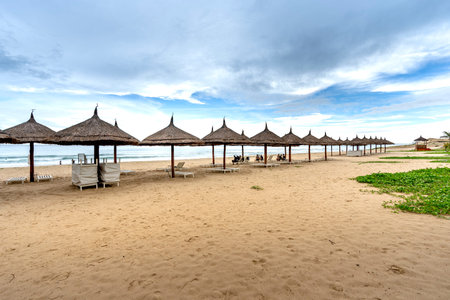 Cam Ranh district, Khanh Hoa province, Vietnam- October 7, 2020: The umbrellas and chairs by the seaside Bai Dai in Khanh Hoa province, Vietnamのeditorial素材