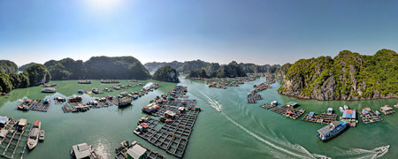 Lan Ha Bay, Vietnam - November 13, 2020: Panoramic photo of a floating fishing village in Lan Ha Bay, Vietnam viewed from above. Famous tourist destination in the north of Vietnamのeditorial素材