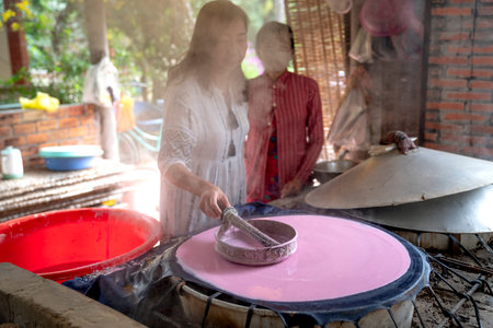 Noodle making village in An Binh Ward, Ninh Kieu District, Can Tho City, Viet Nam-February 7, 2021: Images of the stages of rice cake coating and sun drying to make famous noodles in Can Tho City, VNのeditorial素材