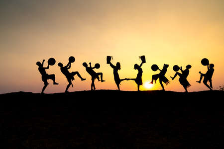 Pleiku Town, Gia Lai Province, Vietnam - March 6, 2021: Ede boys and girls perform their traditional dance during their sunset period in Pleiku town, Gia Lai province, Vietnam. Silhouette.のeditorial素材