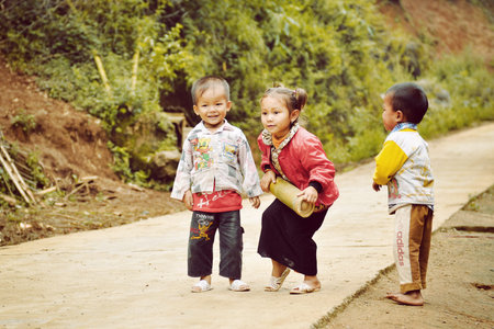 Mu Cang Chai, Yen Bai, Vietnam - October 06, 2012: Children are playing together in the villageのeditorial素材