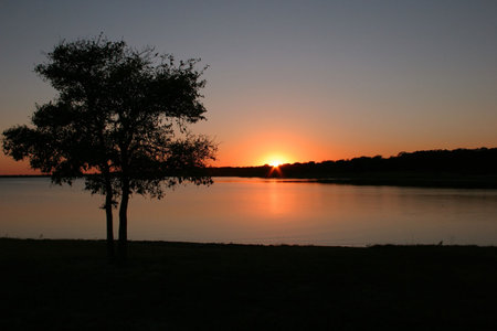 sunset over a lakeの写真素材