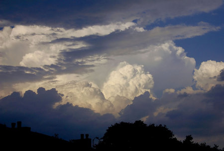 big fluffy clouds in the skyの写真素材