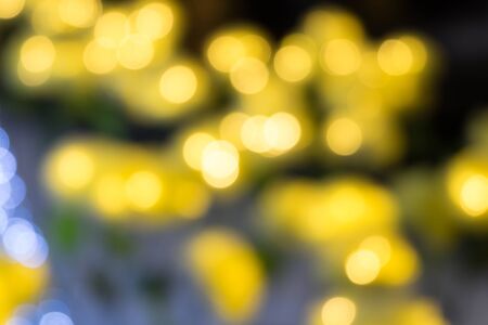 Abstract warmwhite and blue bokeh background.の写真素材