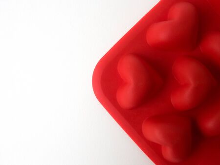 Heart-shaped ice tray silicone mold, valentine concept.の写真素材