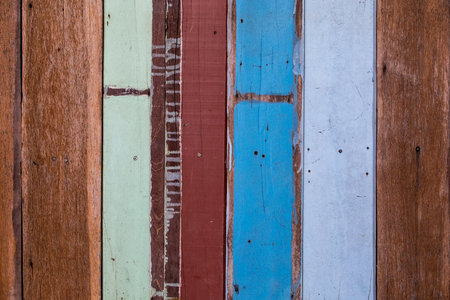 Wooden old wall pattern with random color painting background.の写真素材