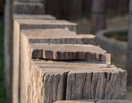 Close up view of old vintage chock wood, fence design countryside style.の写真素材