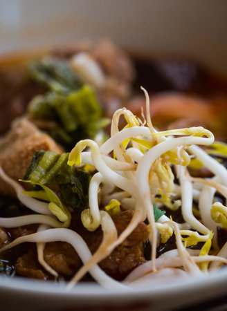Close up view of thai food called  Khanom Jin Nam Ngiao  ,rice noodles in fish curry sauce with...