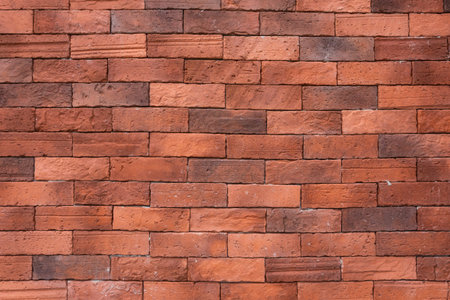 Ancient red brick wall seamless pattern background.